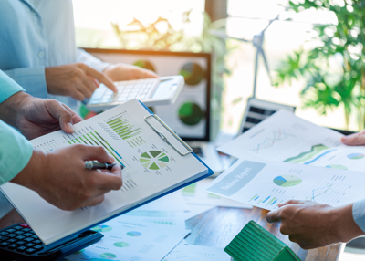 team analyzing financial reports with charts and graphs demonstrating growth potential and data insights for effective decision making and strategy implementations